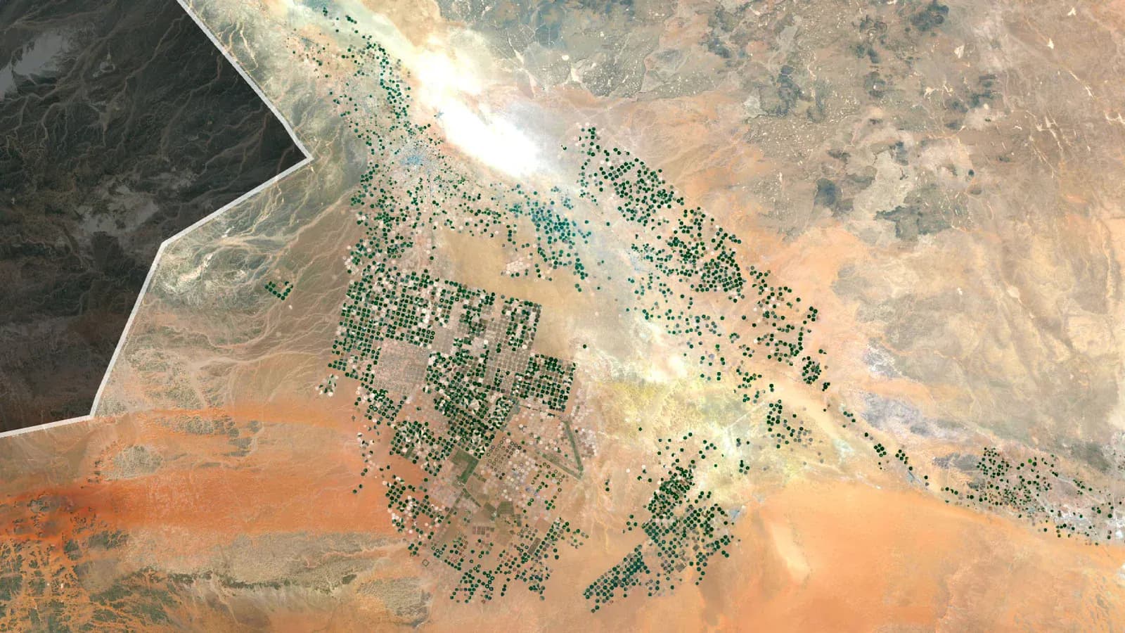 Satellite view of a refinery in a desert landscape